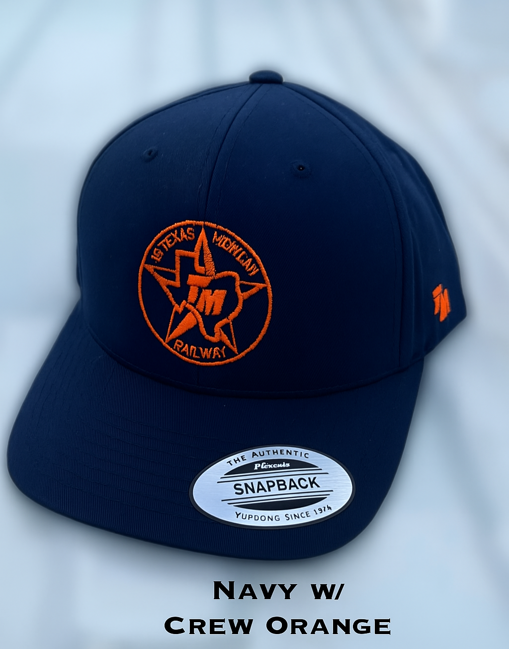 TM Crew Orange Stitch Hats
